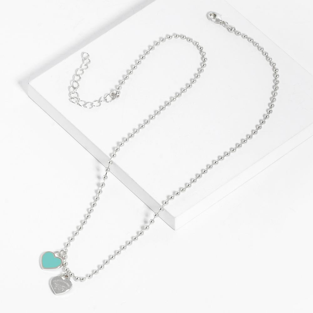 Collar de doble corazón